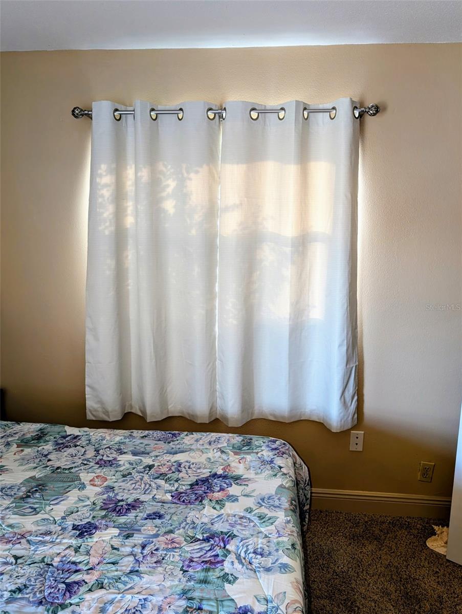 New drapes in primary bedroom