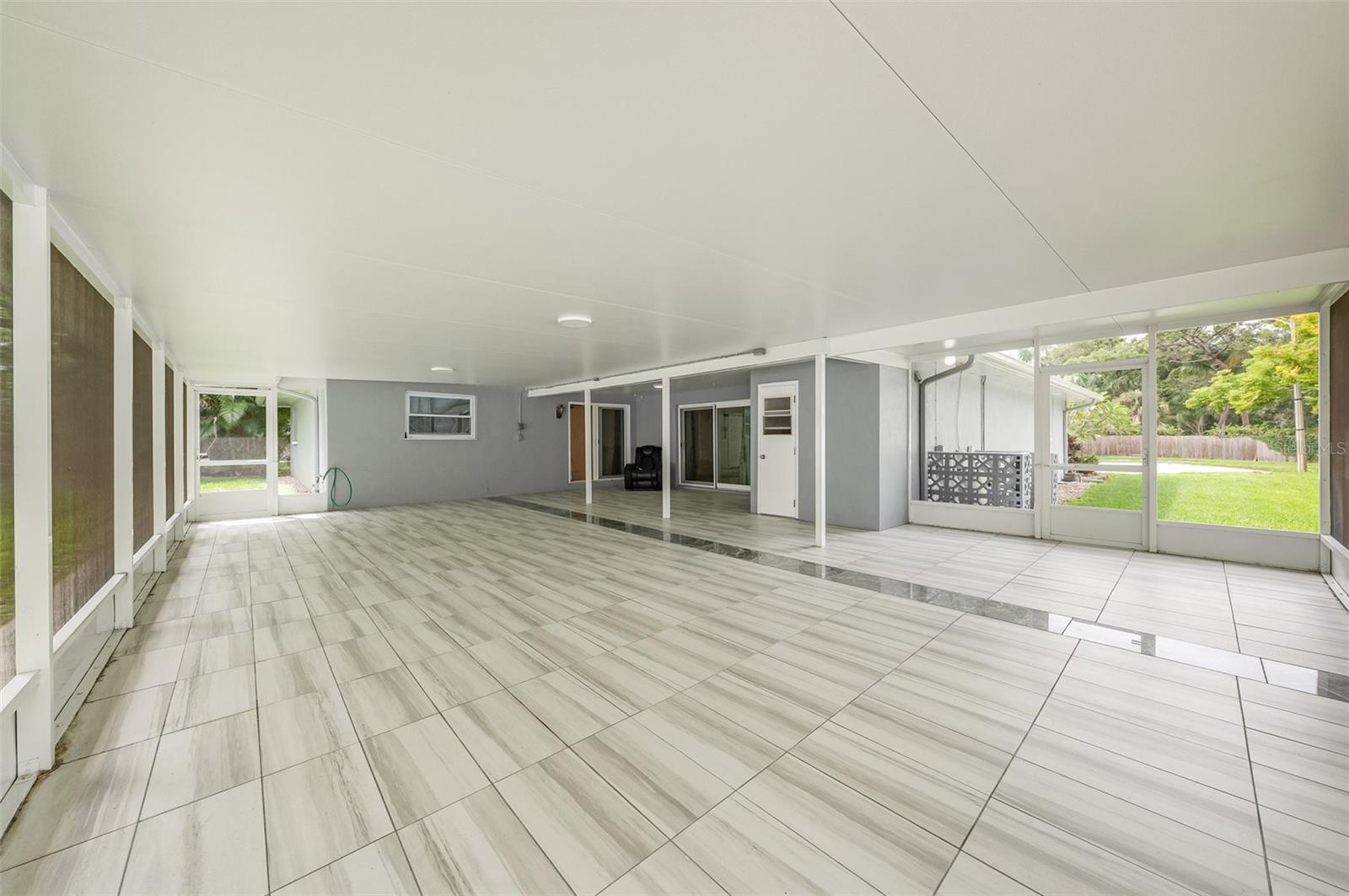 Huge screened in lanai perfect for entertaining.