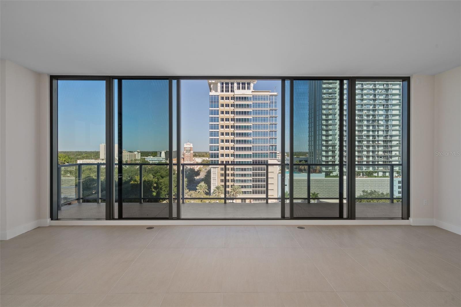 View from the Kitchen Sink with Partially Open Sliders
