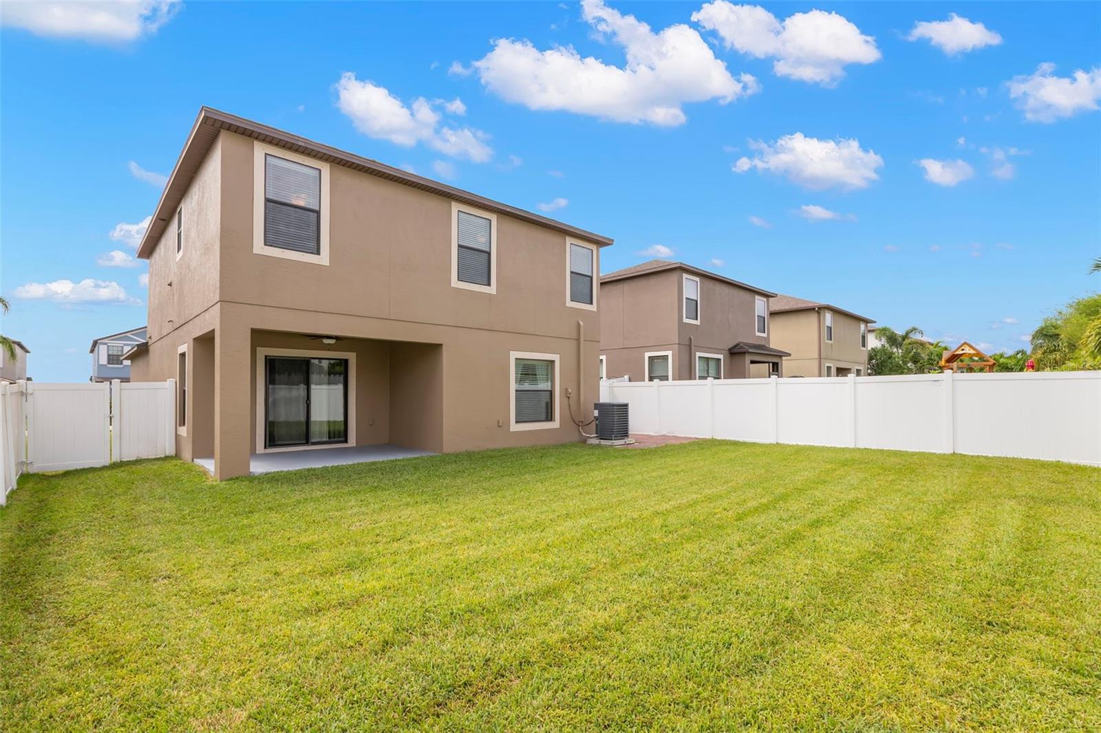 Spacious fenced back yard with room for a pool!