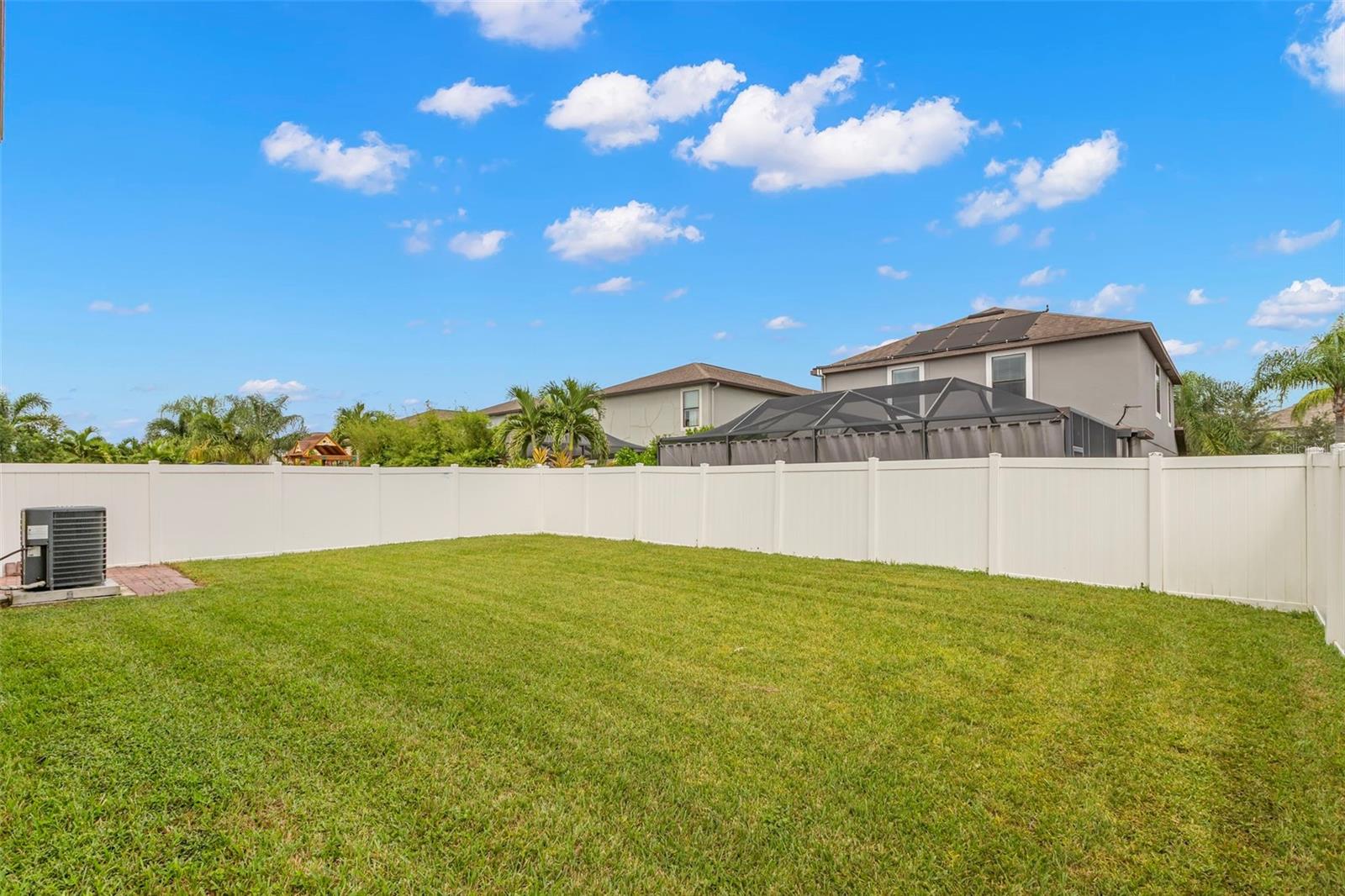 Spacious fenced back yard with room for a pool!