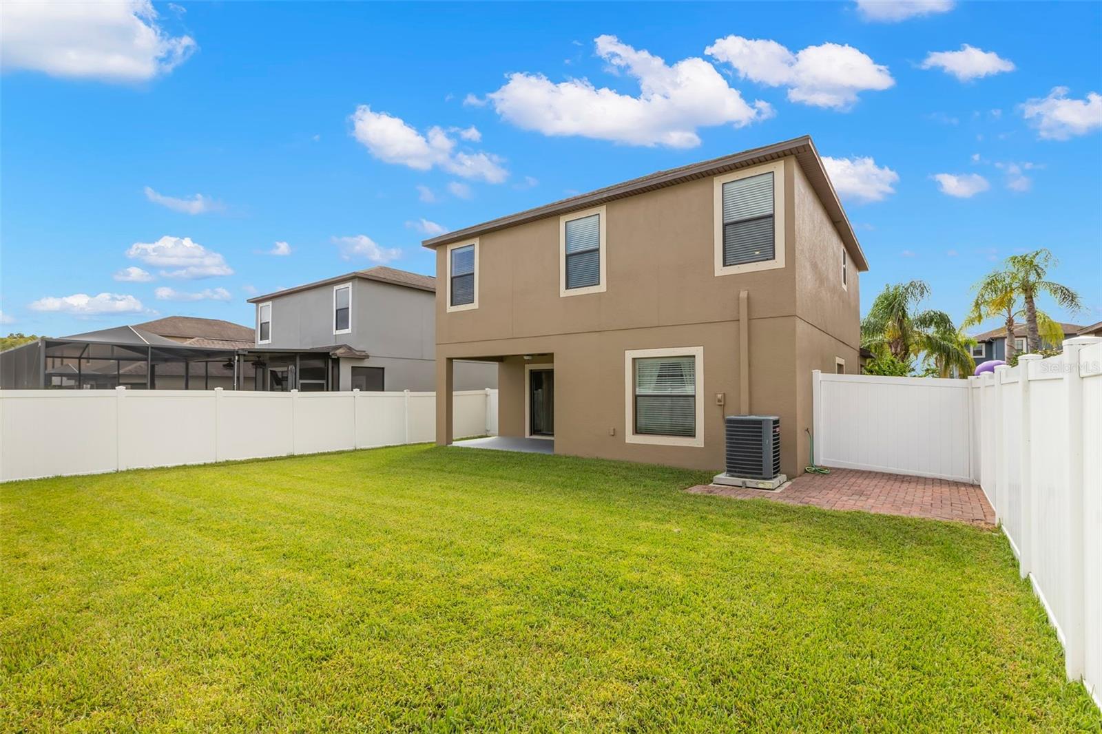 Spacious fenced back yard with room for a pool!