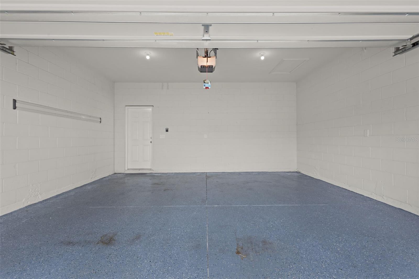 2 car garage with epoxy flooring
