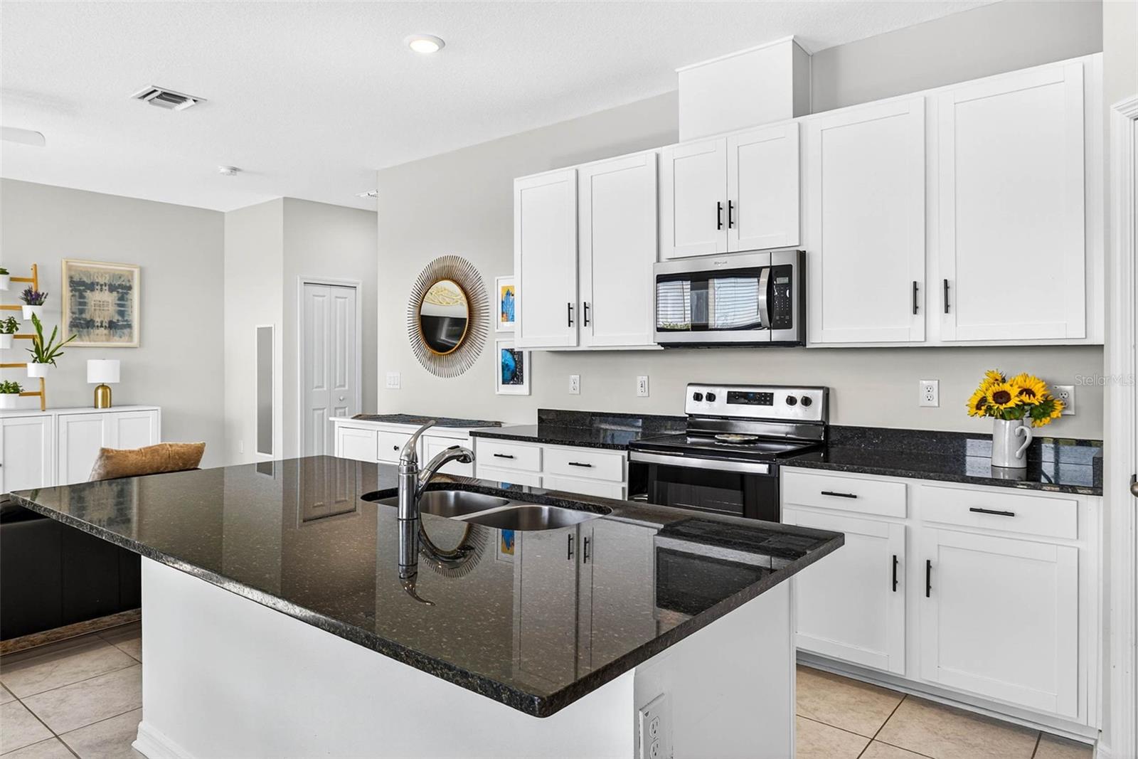 Sit at the island or fit a dining table for everyone.