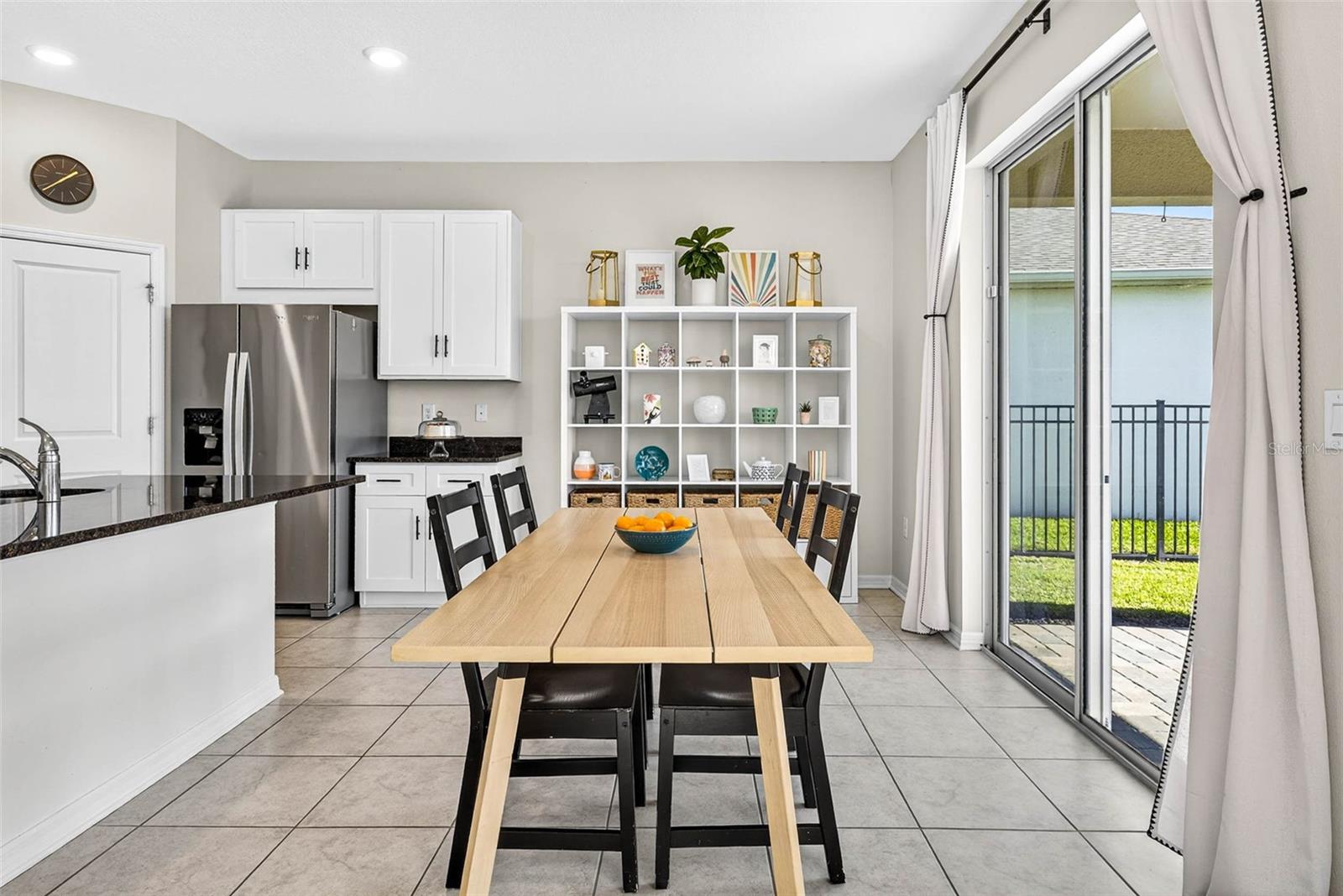 Table for 6 fits in the dining area.