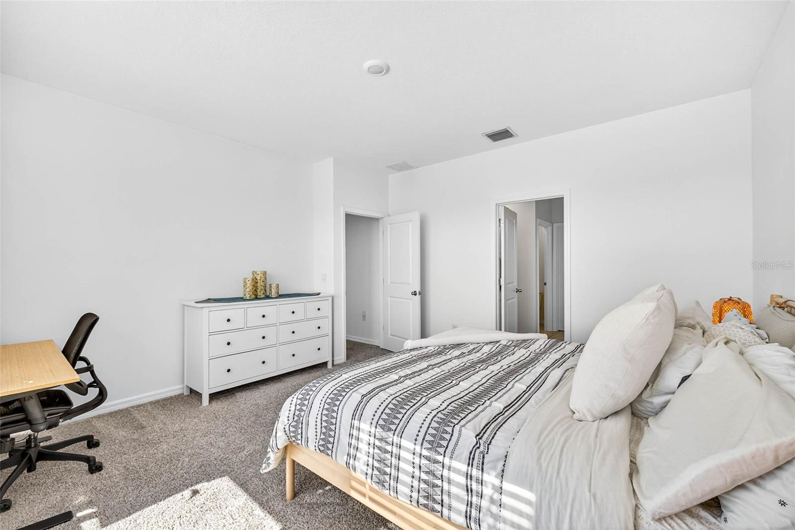 Primary looking toward the ensuite bath.