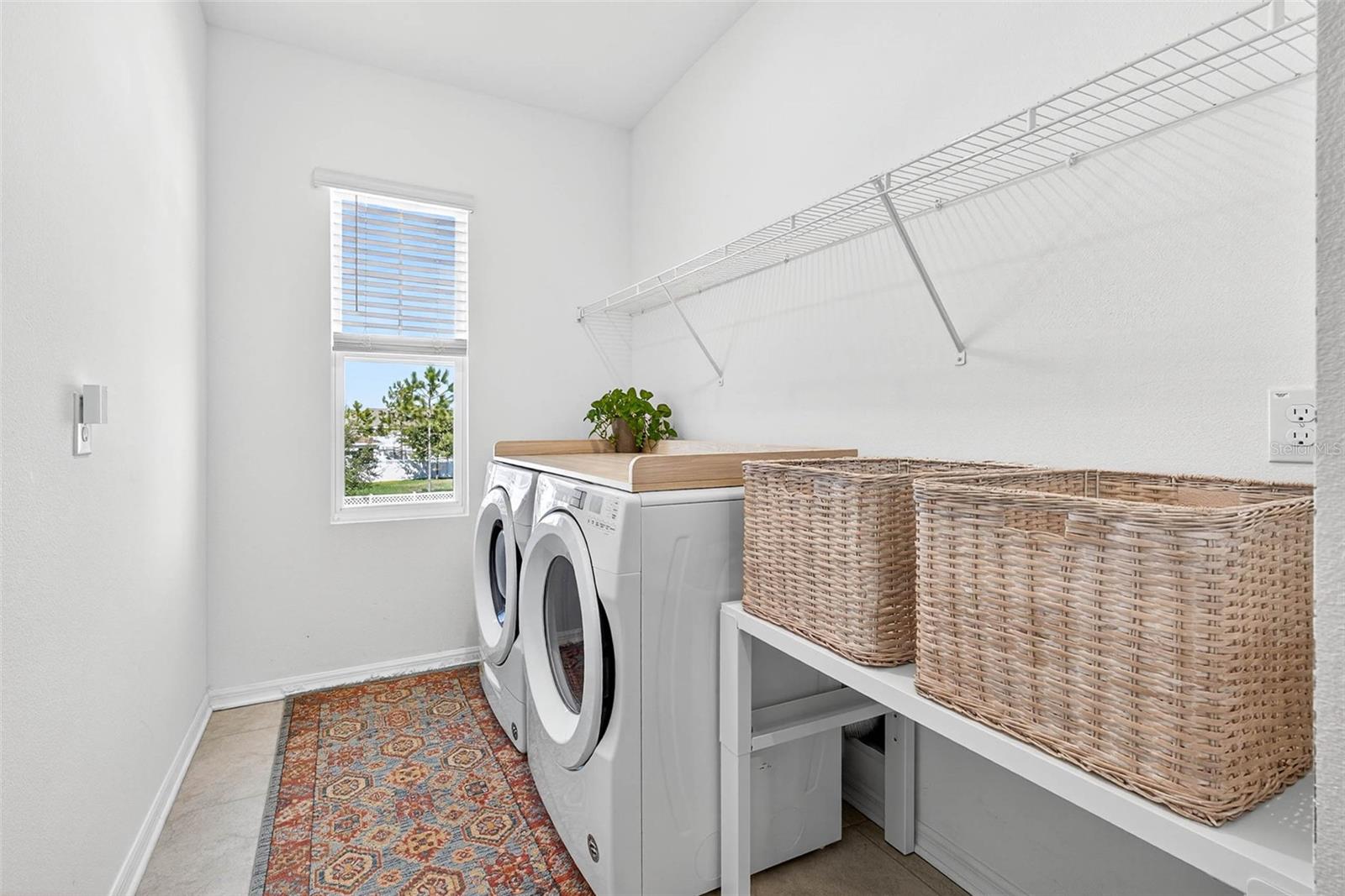 Laundry room second floor with additional storage space added.