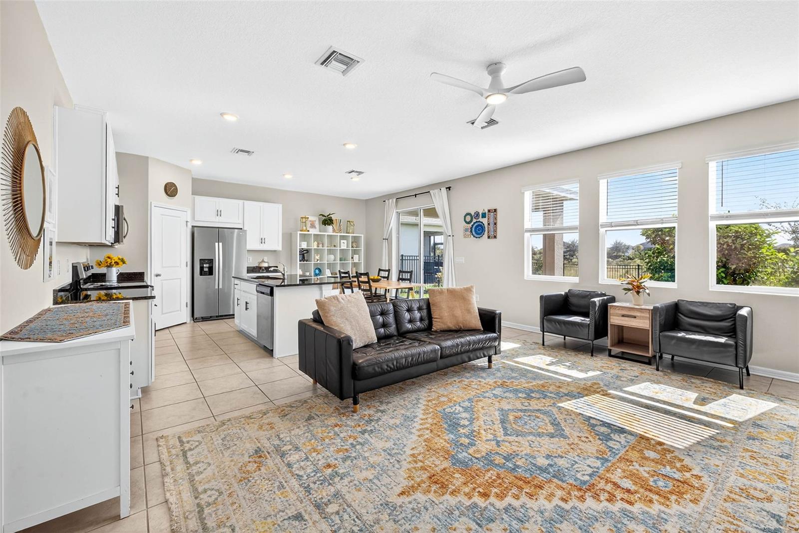 Open floor plan leaves options for the living and dining areas.  Enjoy natural light from the backyard facing WEST as the sun rises and stays bright throughout the day.