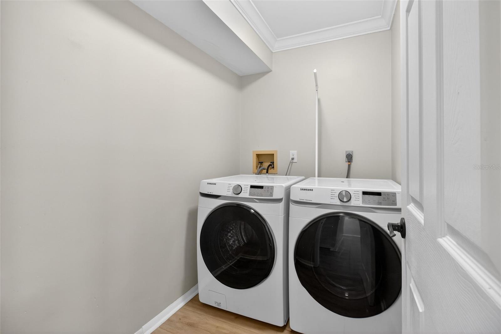 Laundry room with washer and dryer included
