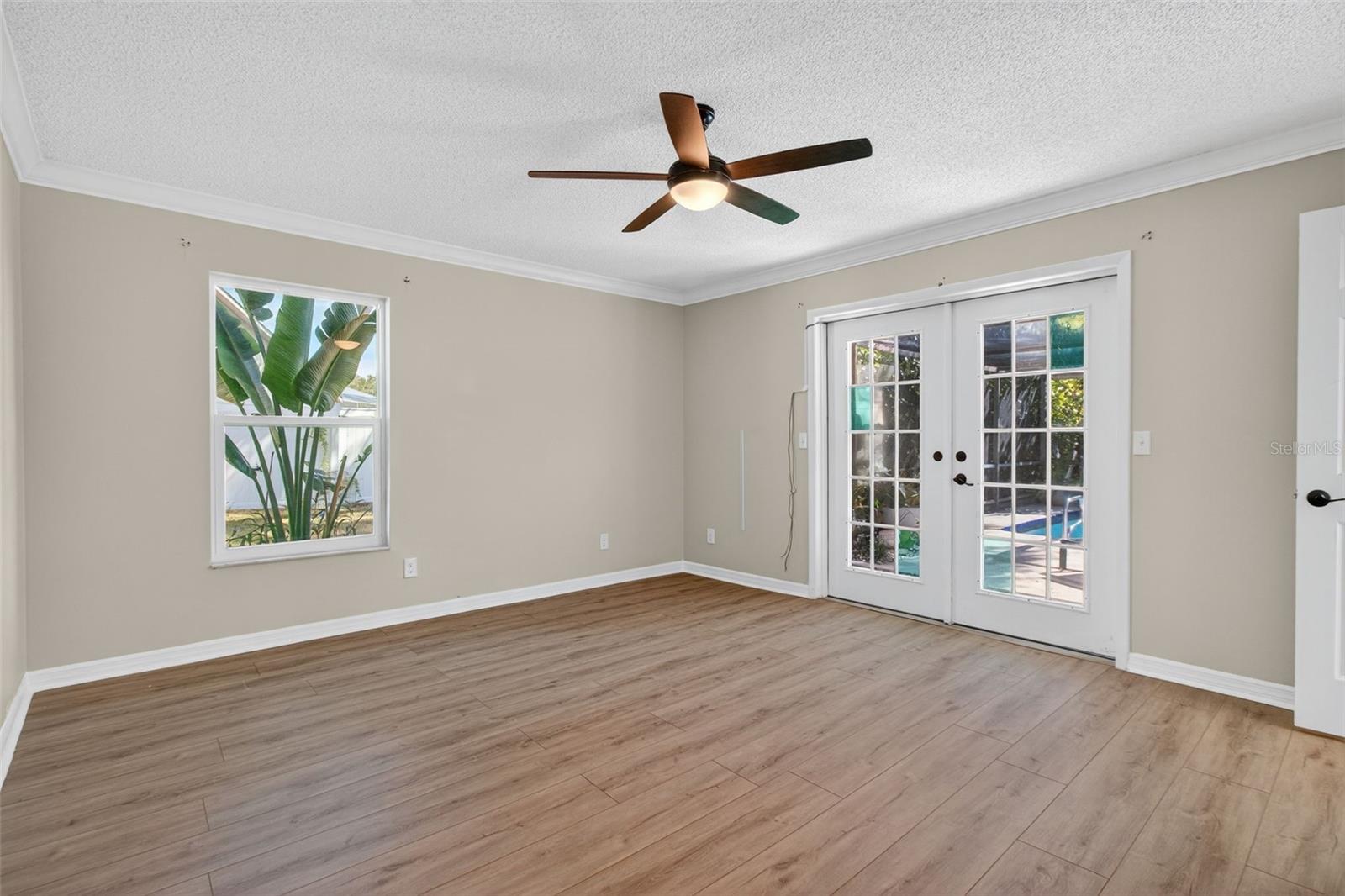 Primary bedroom view of pool