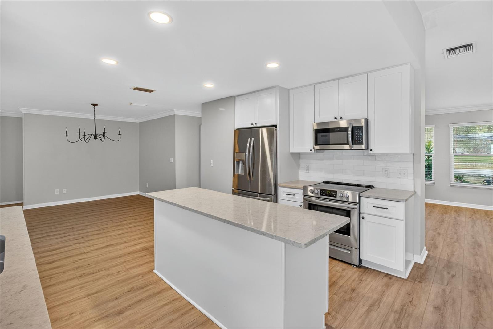 Chef inspired kitchen with quartz countertops.