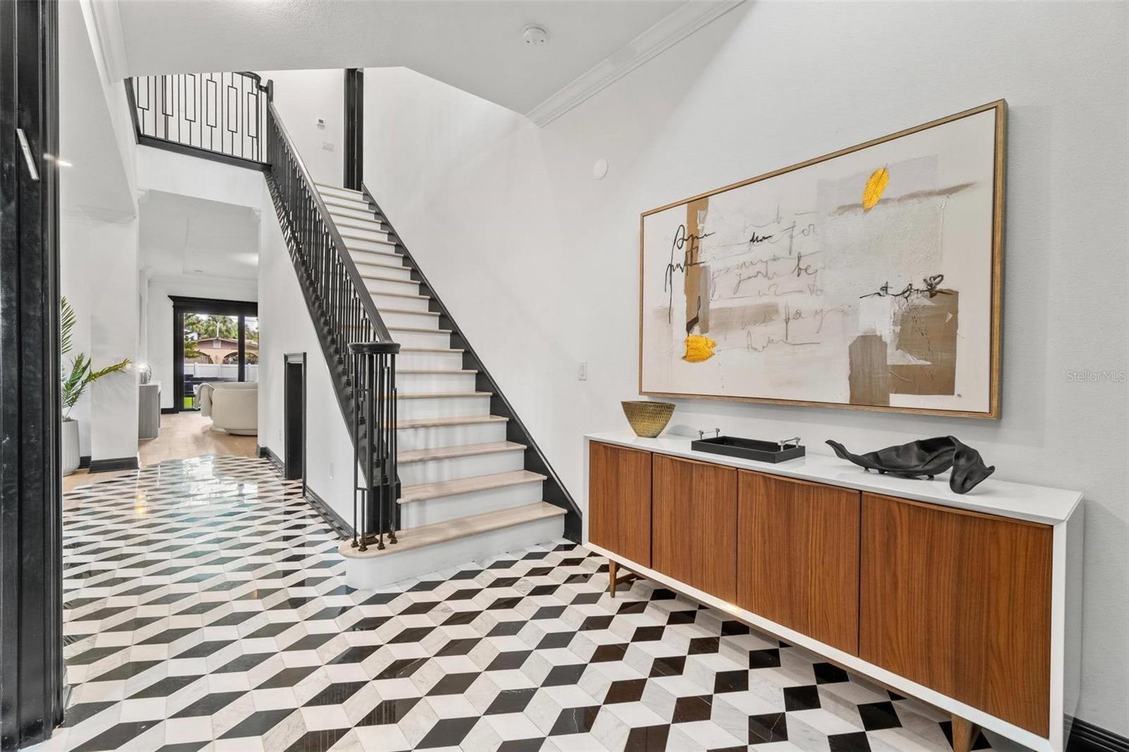 Grand Entry with Marble Hexagon Tiles Hand-Cut & Laid.