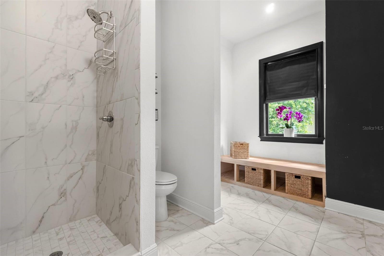 Mudroom w full bathroom and plenty of possibilities!