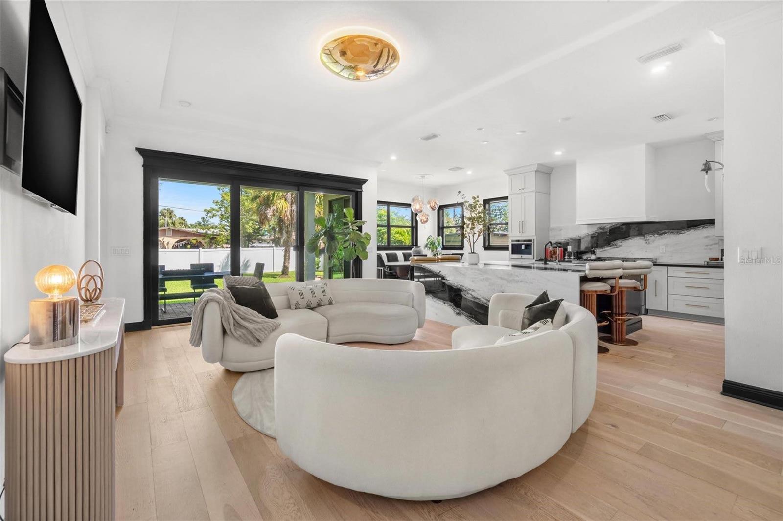 Living Room with Sliders to Outdoor Living Space.