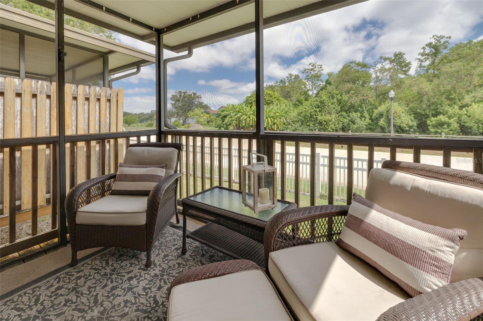 Scerened in Rear Porch with View of Scenery & Horse Trail