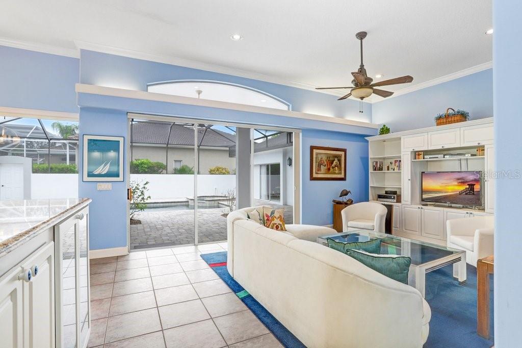 Family Room with Sliders out to Courtyard and Pool