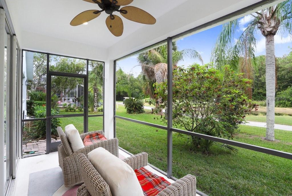 Back Porch off of Formal Areas Overlooking Pond and Golf Course