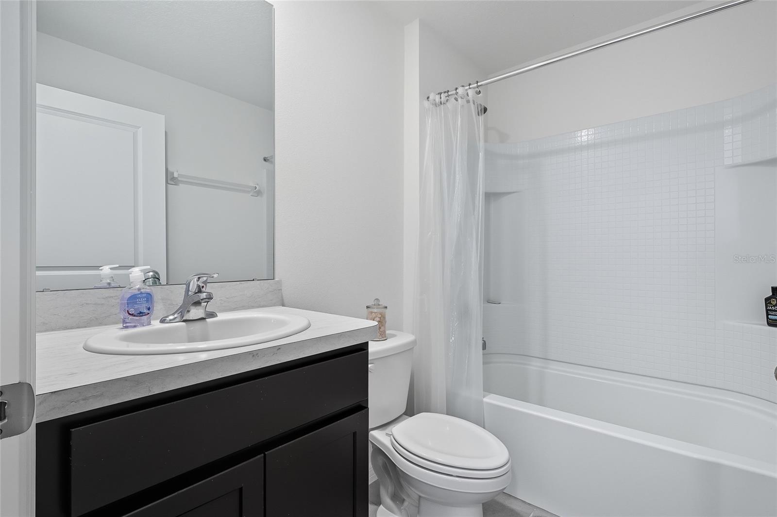 Bathroom located next to Bedrooms 2 and 3