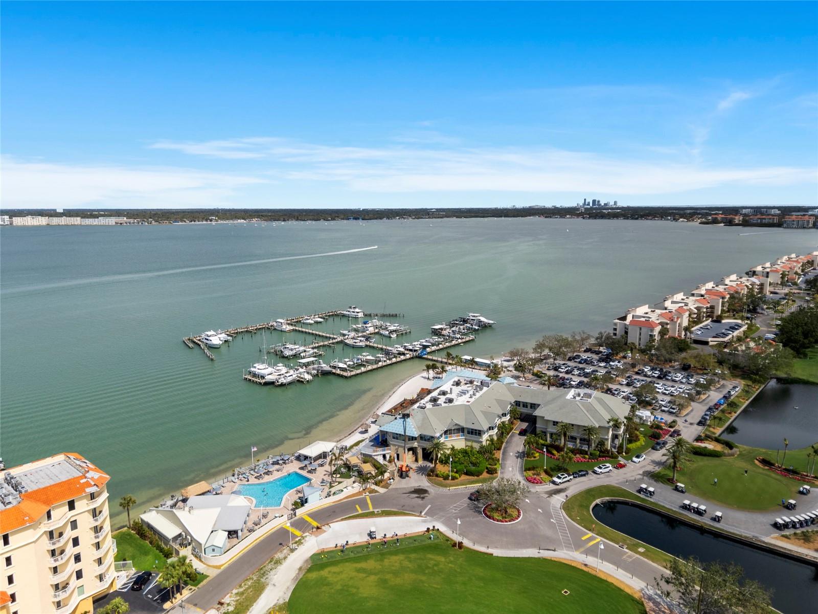 Aerial View of Isla Del Sol Yacht & Country Club including the Club House, Pool, Boat Slips