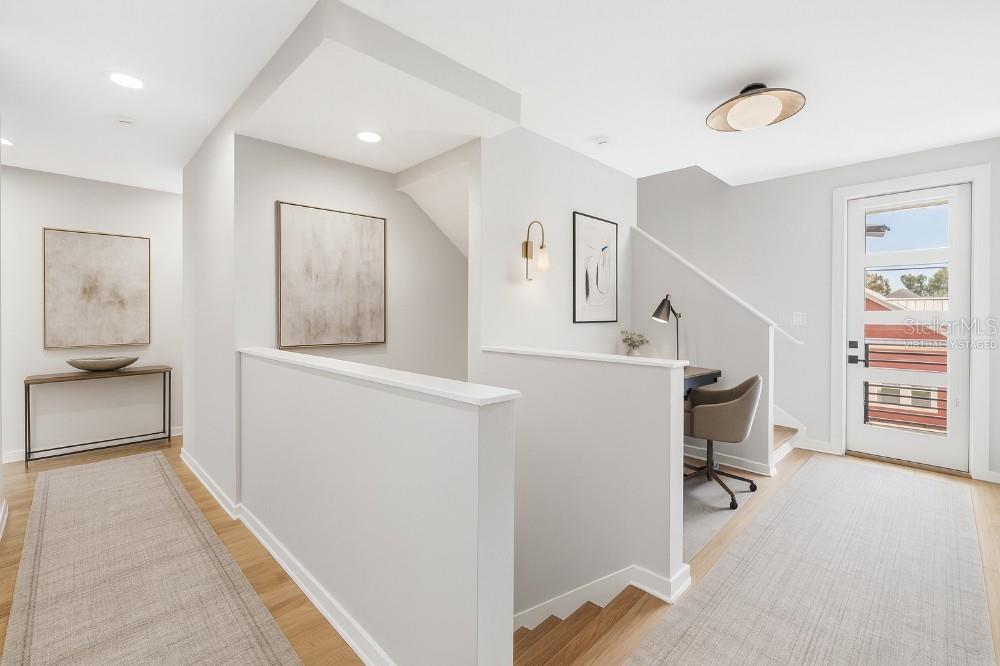 Virtually staged second floor landing and Hallway