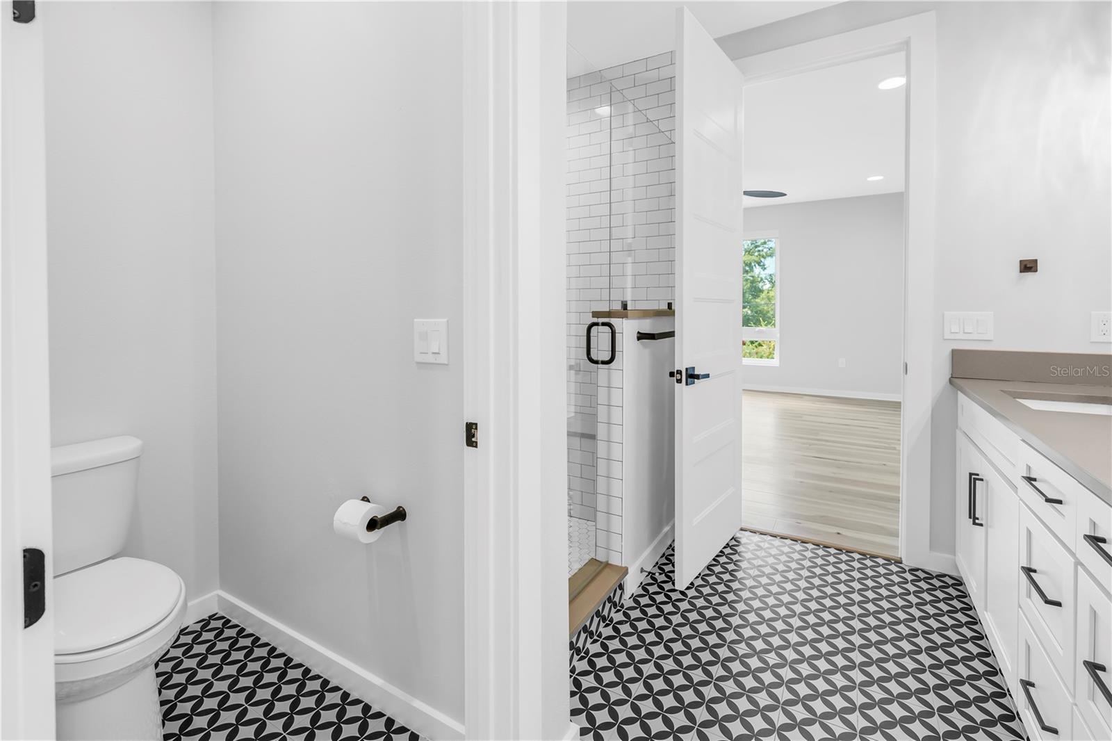Primary bathroom has separate water closet