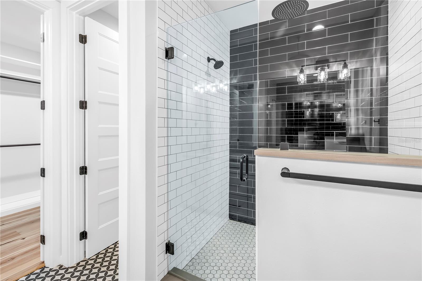 Access the primary closet through the primary bathroom.