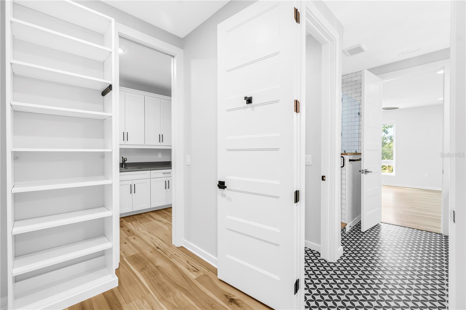 Access to laundry room through primary closet!