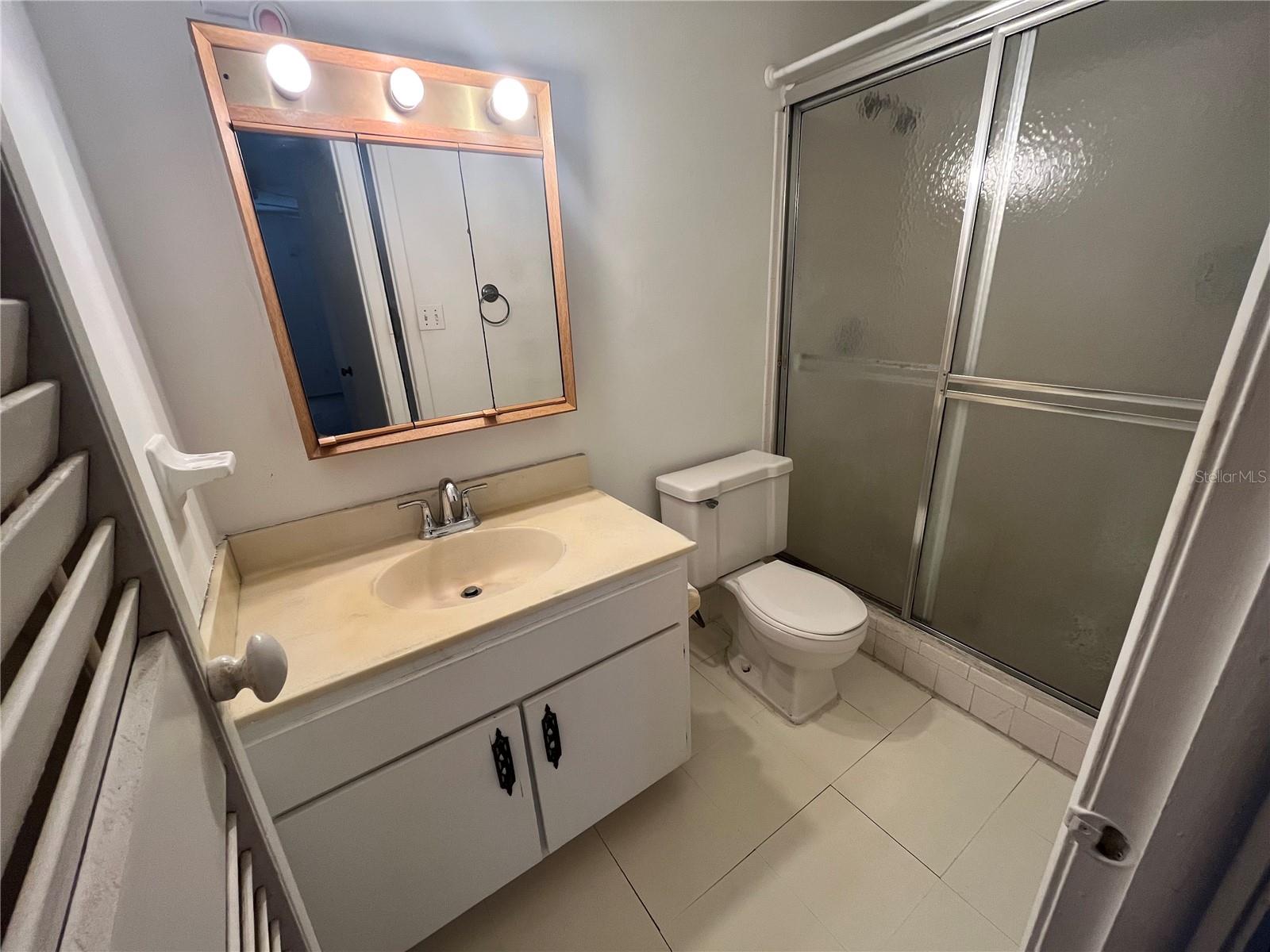 Primary bedroom with its  private full bathroom