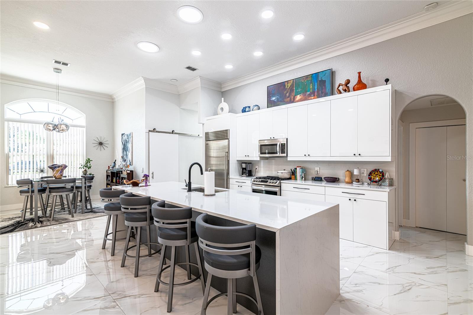 VIEW OF KITCHEN AND DINING AREAS