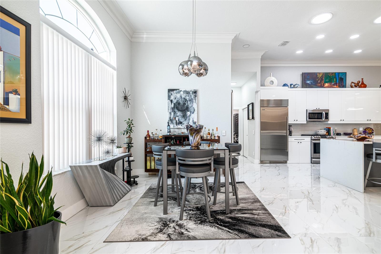 VIEW OF DINING AREA AND KITCHEN AREA
