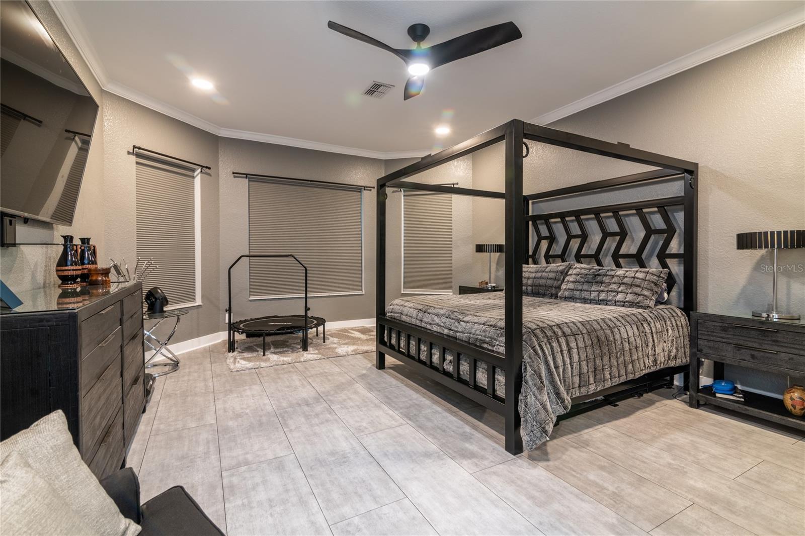 PRIMARY BEDROOM - CEILING FAN LVT FLOORS