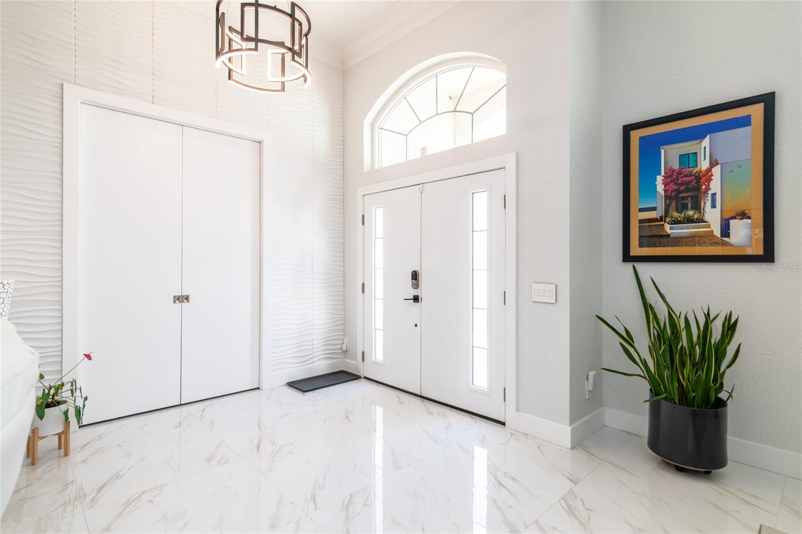ENTRANCE SHOWING SOLID WOOD DOORS