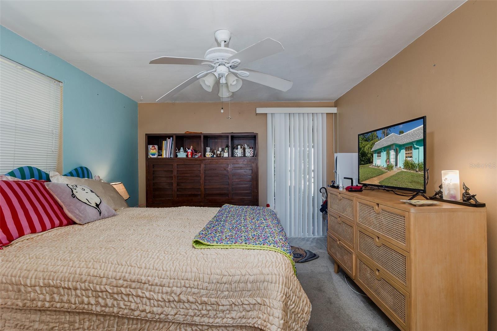 Primary with sliders out to Florida Room
