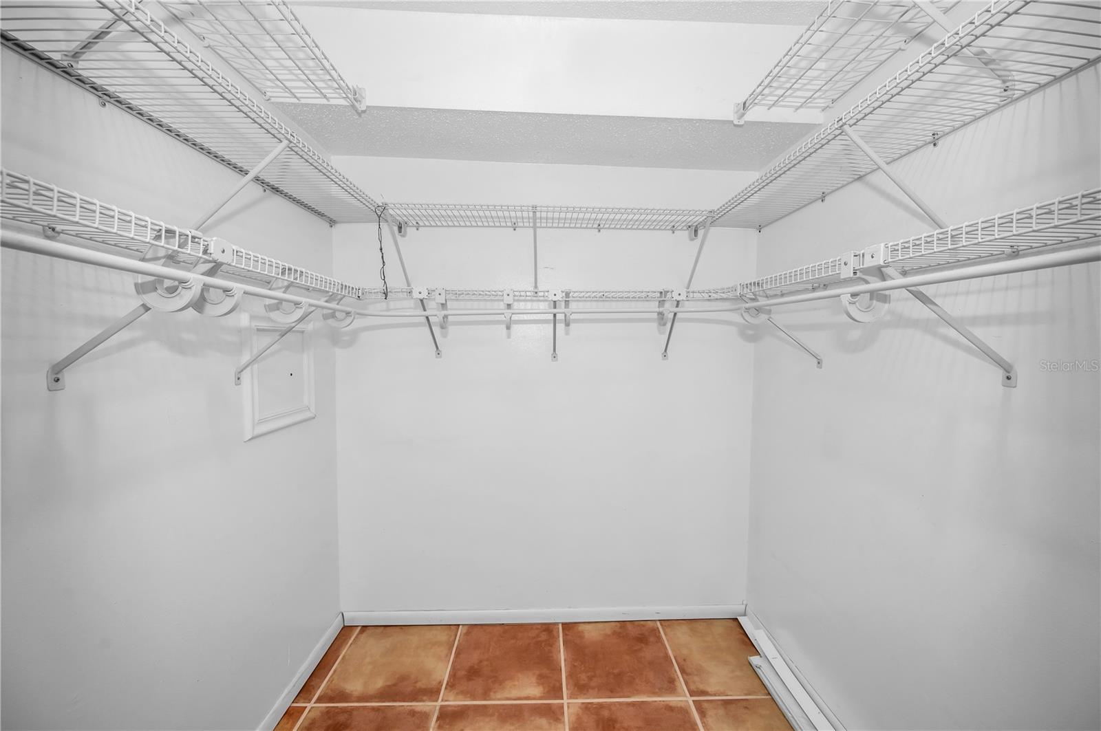 Primary Bedroom walk-in closet