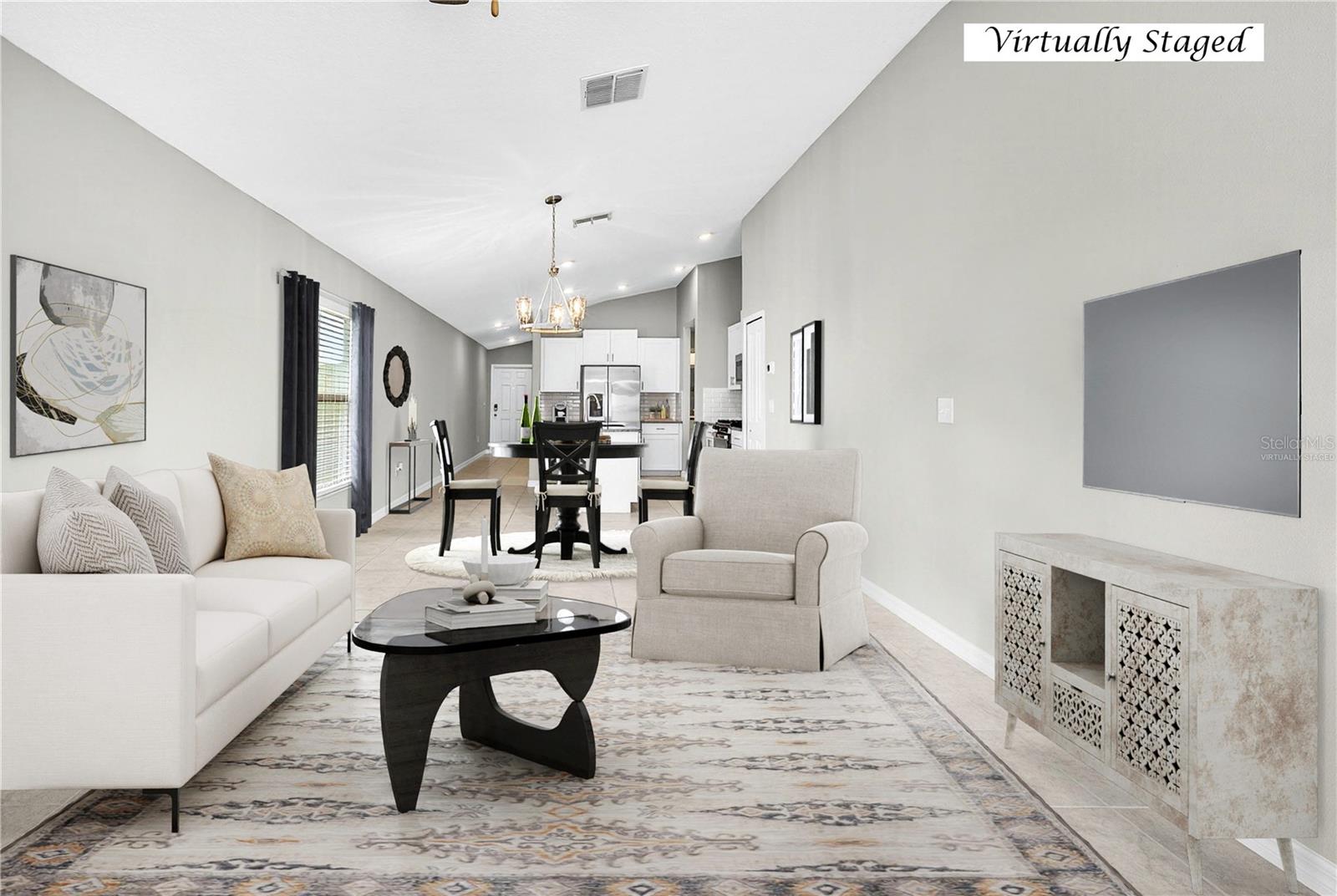 great room view back to kitchen virtually staged