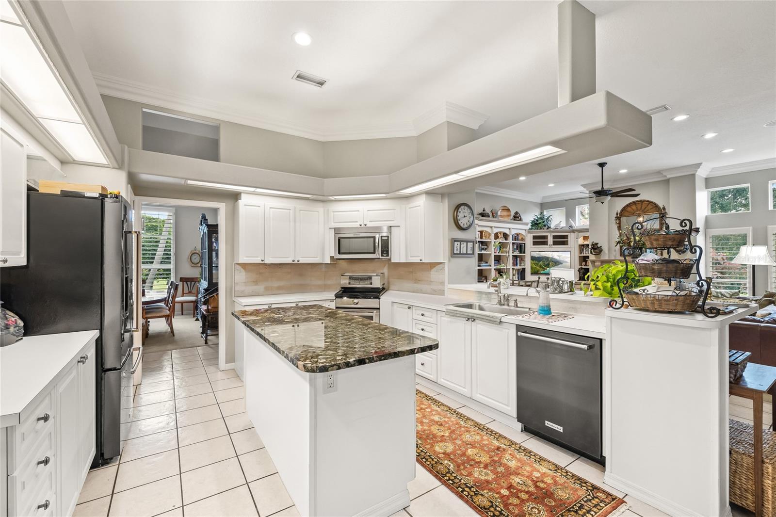 Centrally located kitchen with extra space for cooking together and entertaining.