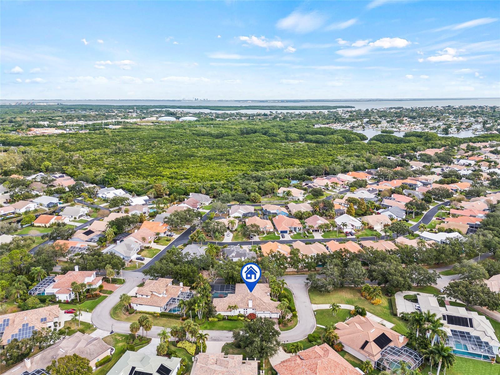 Covering a full corner lot, this home provides true privacy.