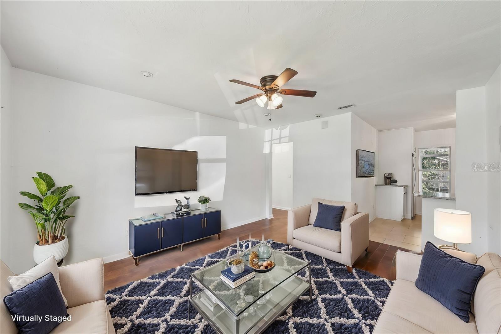 Bright and inviting living room with seamless flow to the kitchen