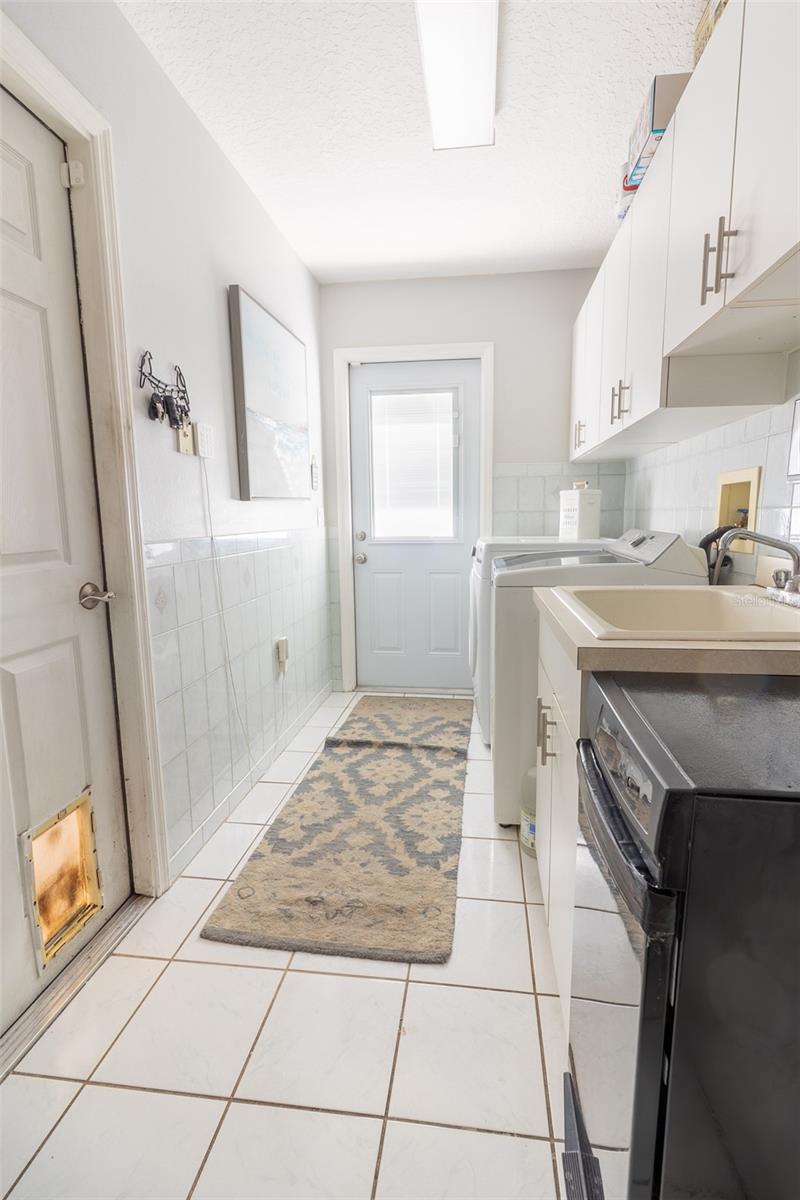 Laundry hall to drive and garage.