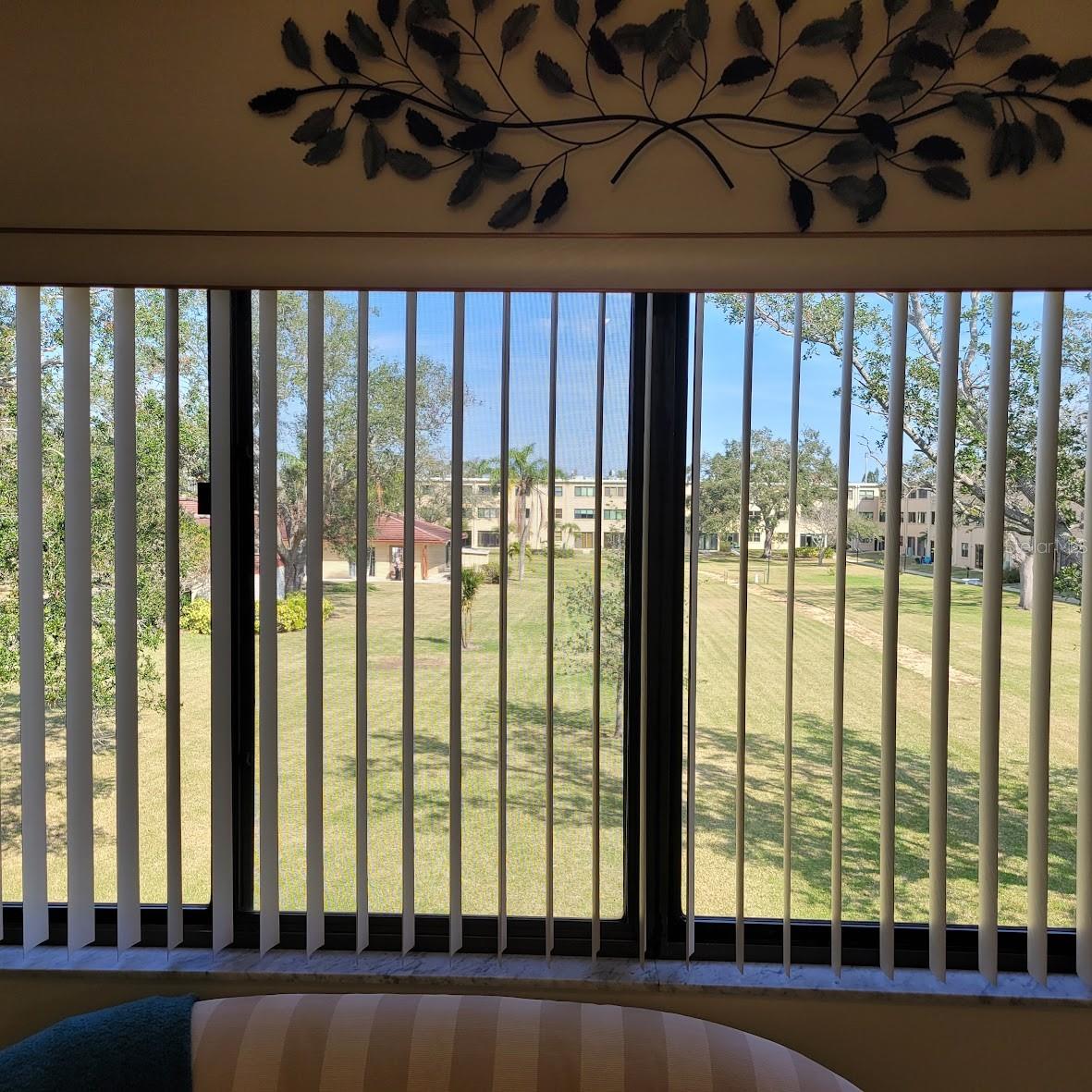 The view from the Florida Room is the courtyard and clubhouse.
