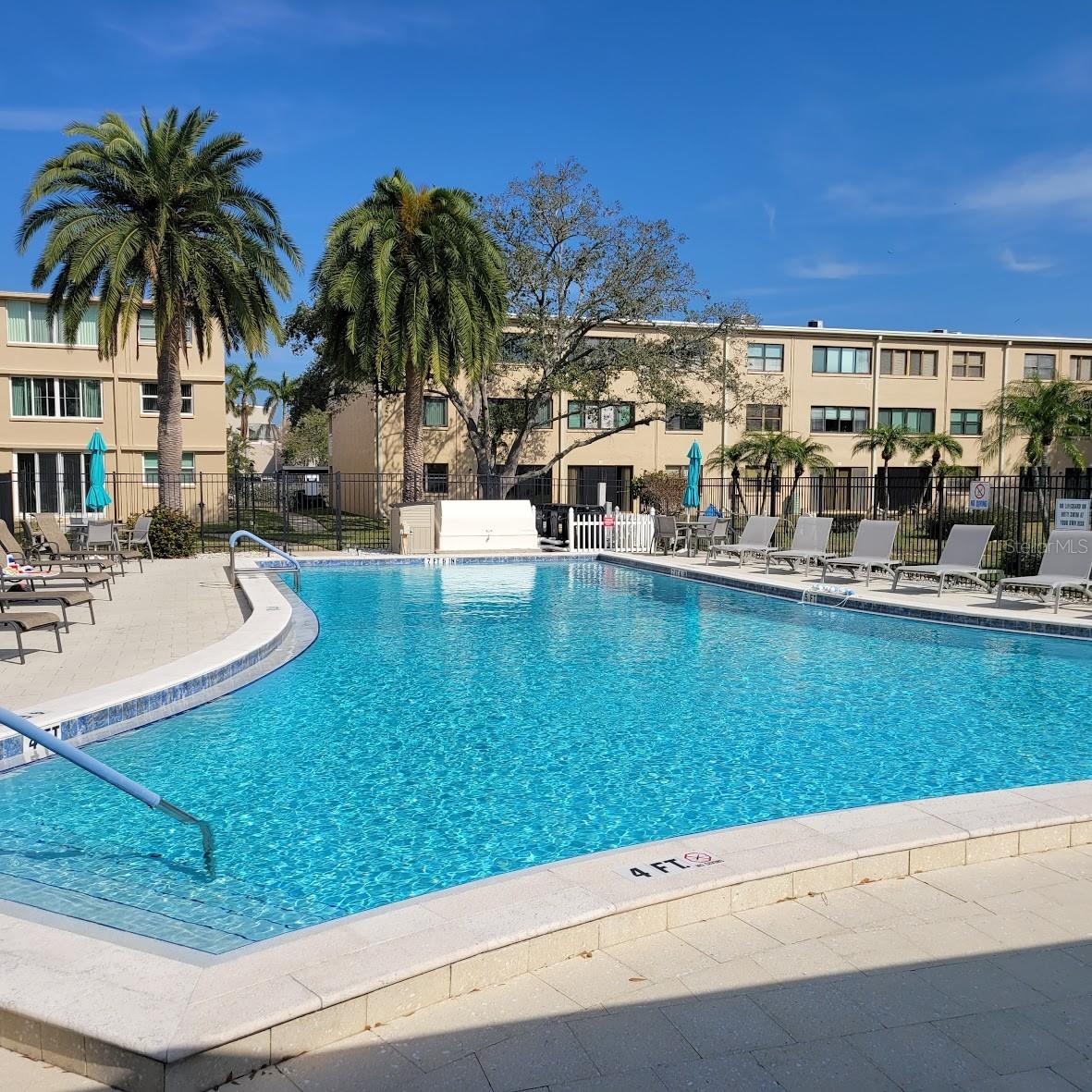 Welcome to the gorgeous pool area. Lots of chairs for sunbathing and relaxing!