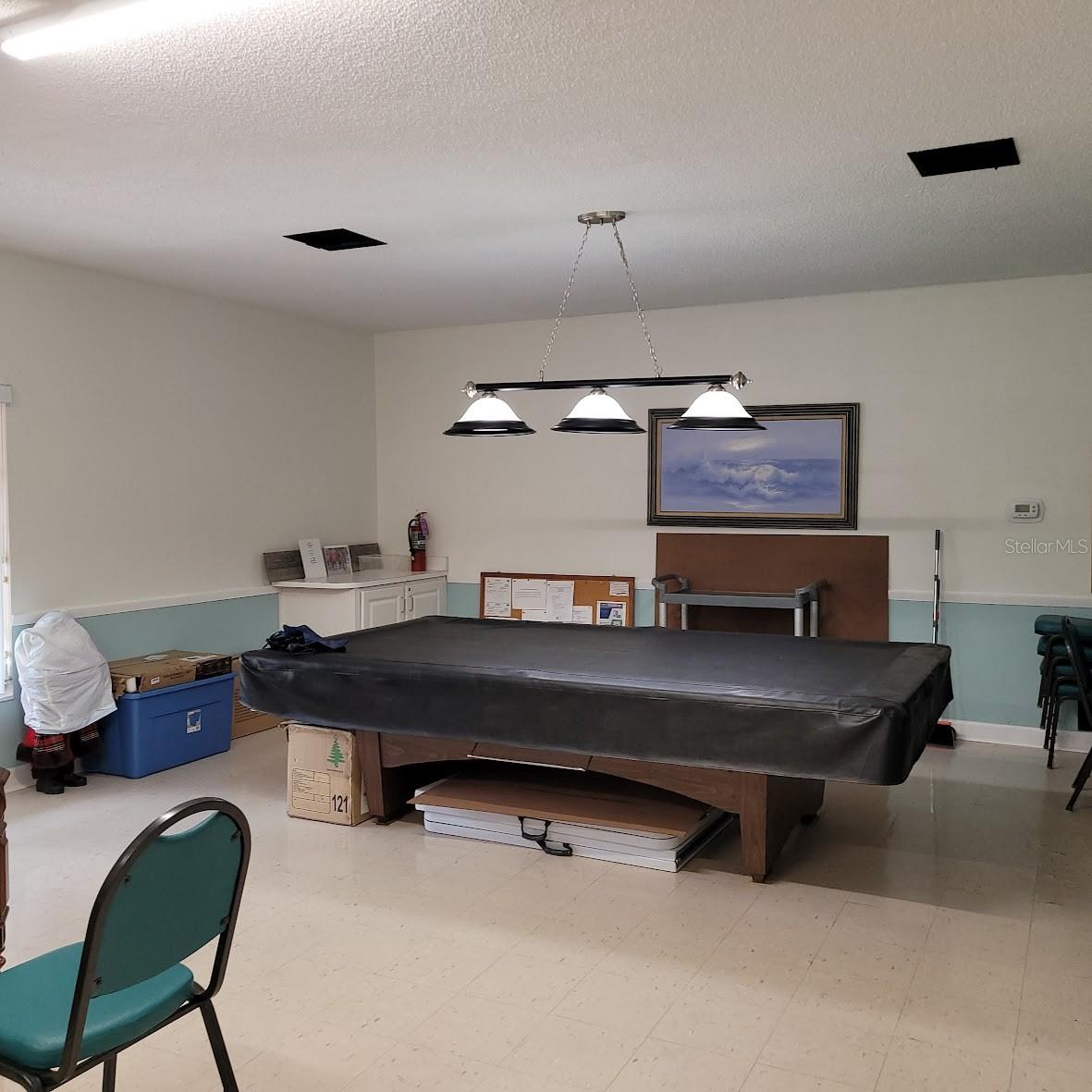 Stop by for a game of pool.
