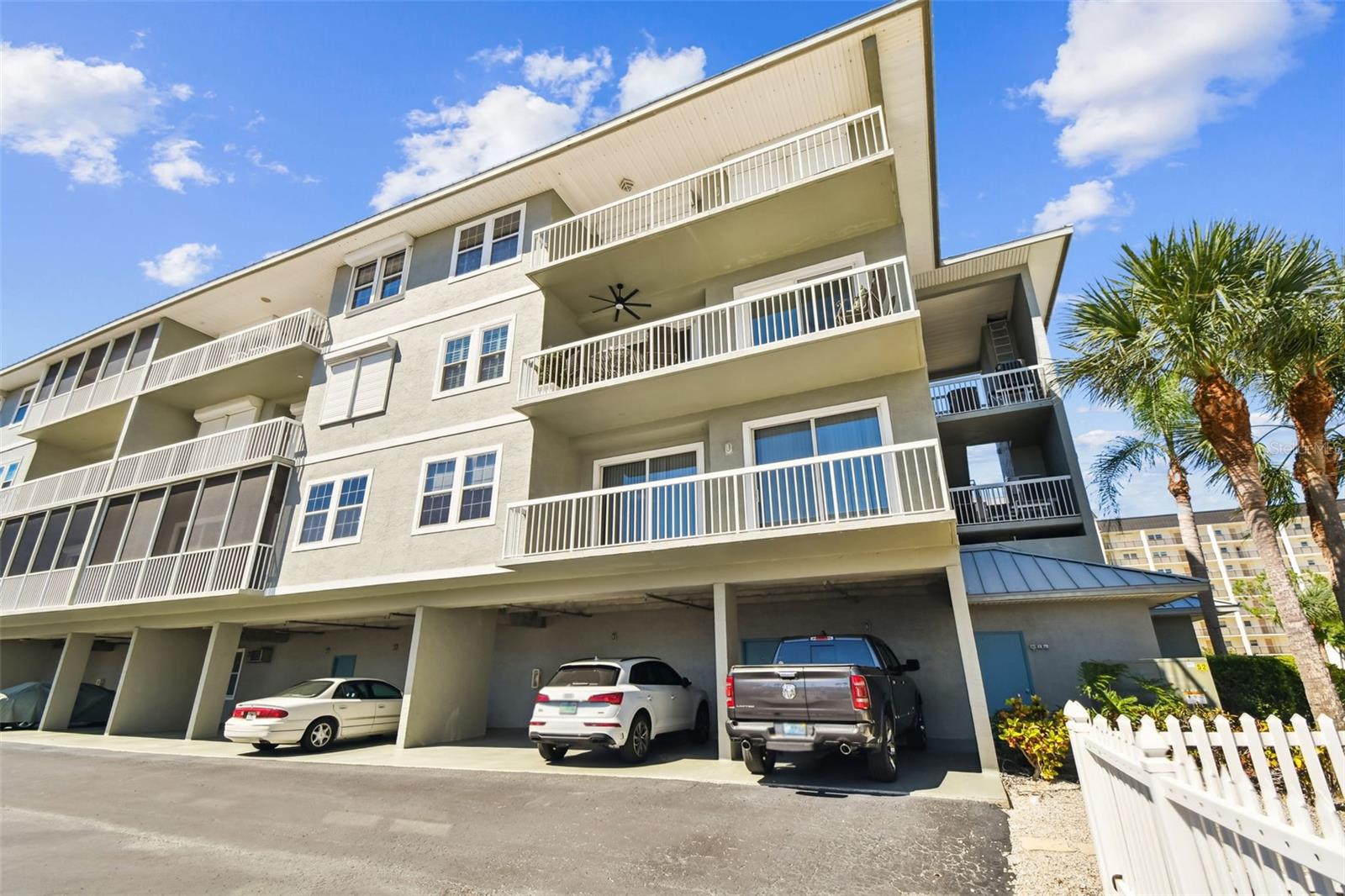Your 2 parking spaces & balcony above with ceiling fan