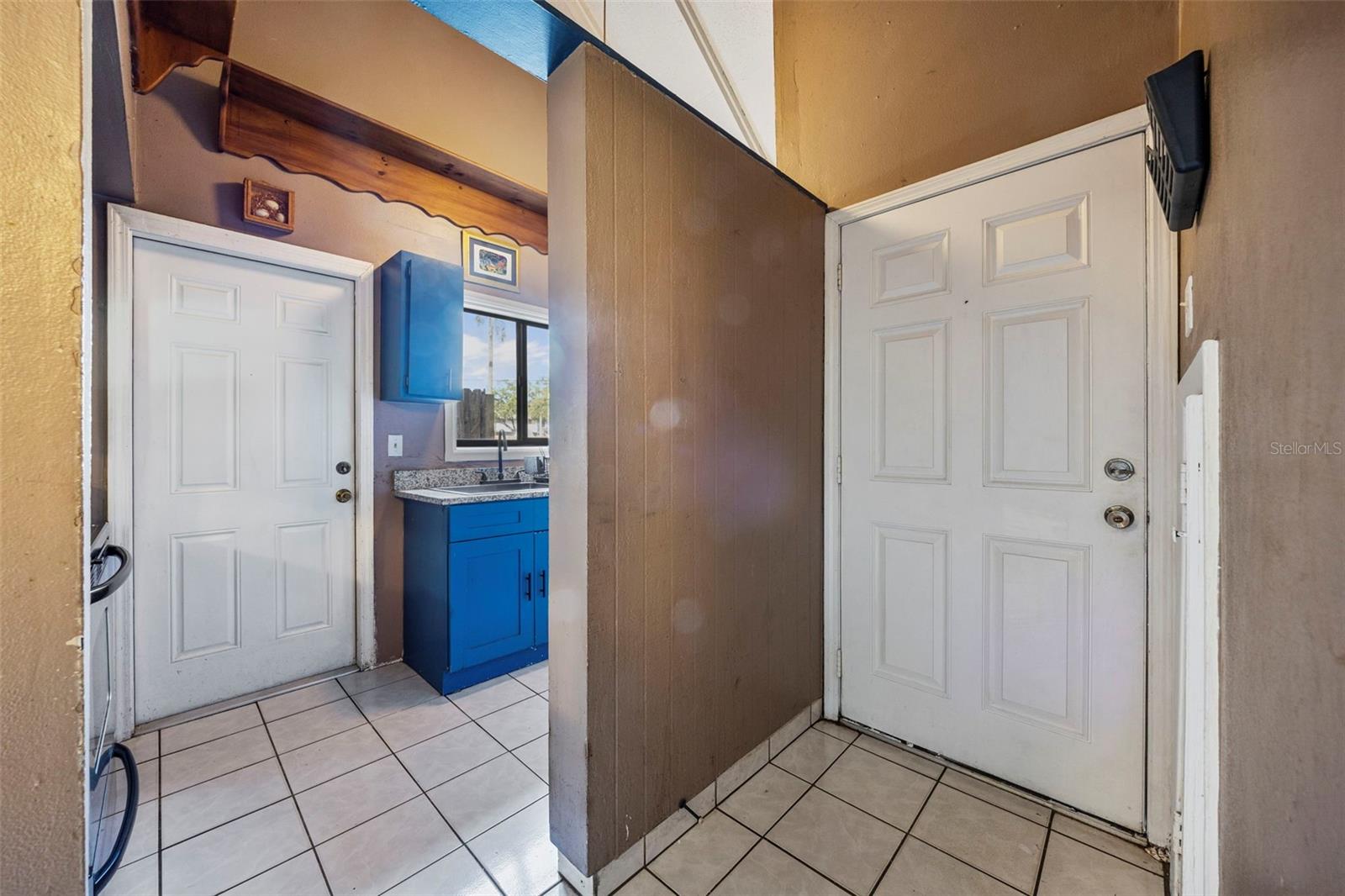 Front door going into kitchen