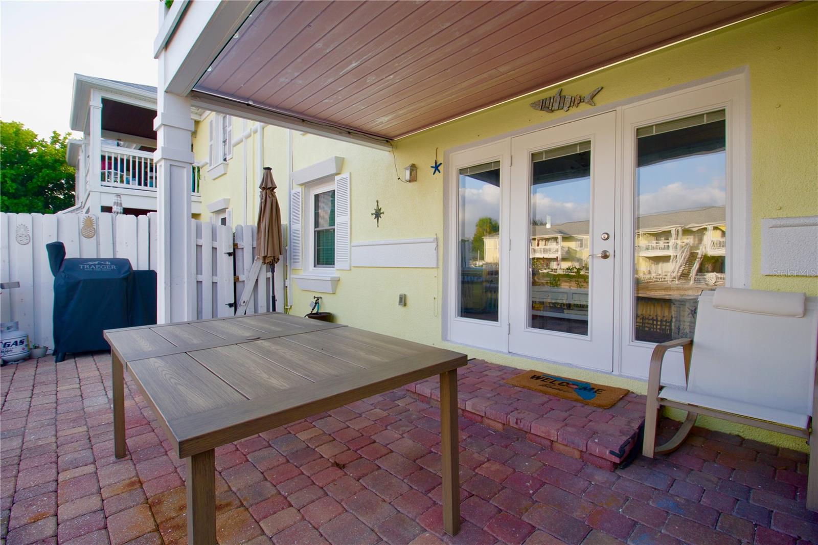 LARGE PATIO OVERLOOKING CANAL