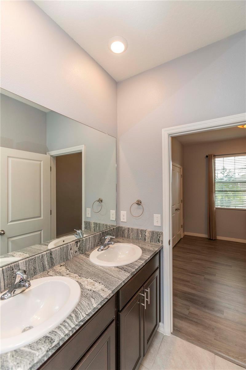 Jack and Jill Bathroom opens to Bedrooms 2 & 3