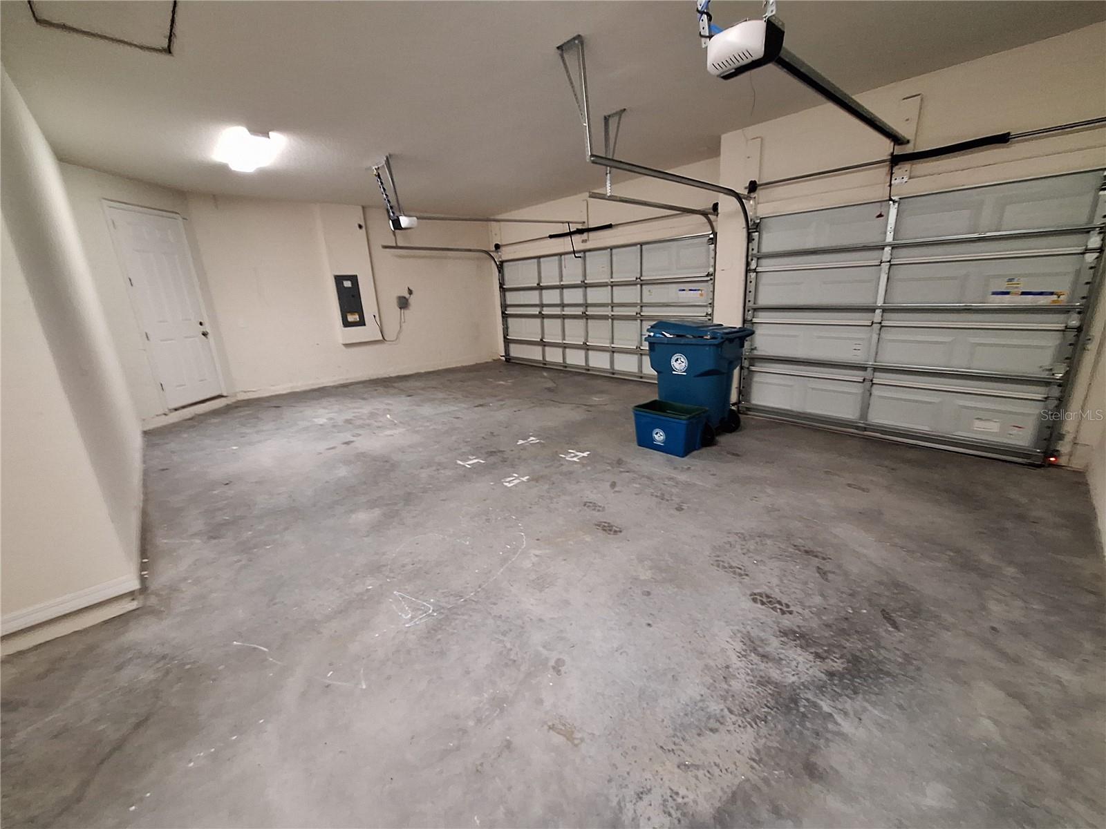 Very Roomy 3 Car Garage 2 Entrances into house
