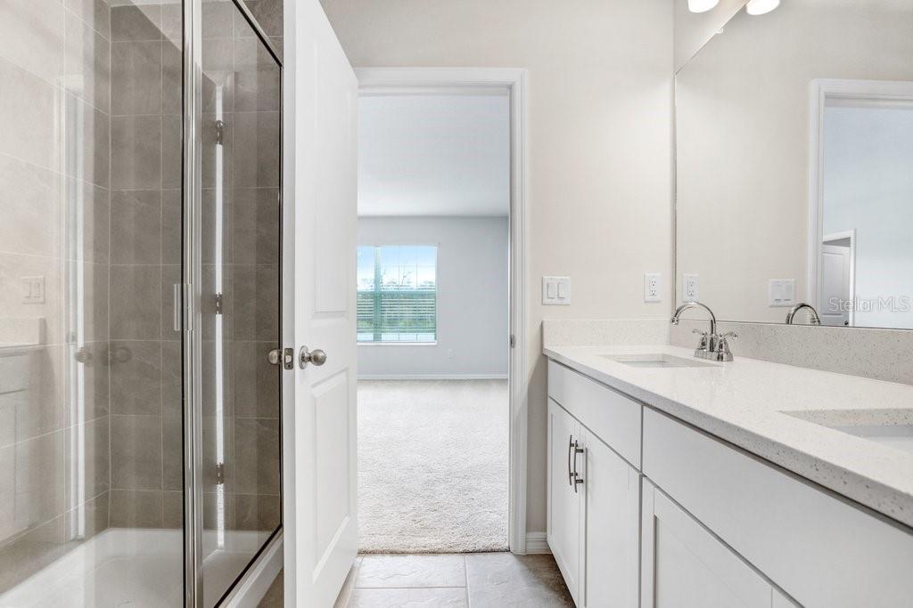 Primary Ensuite with Tiled Shower! (photo of model)