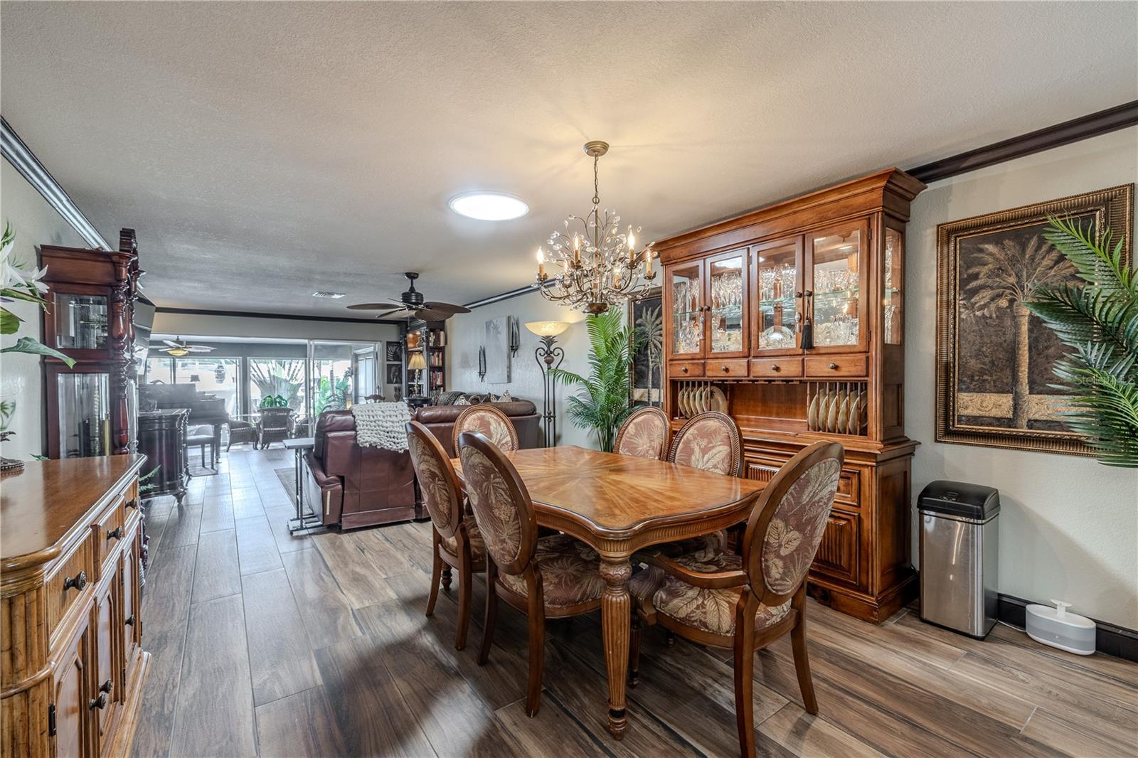Expansive dining and living areas transition naturally to the waterfront views, perfect for everyday comfort or entertaining guests.