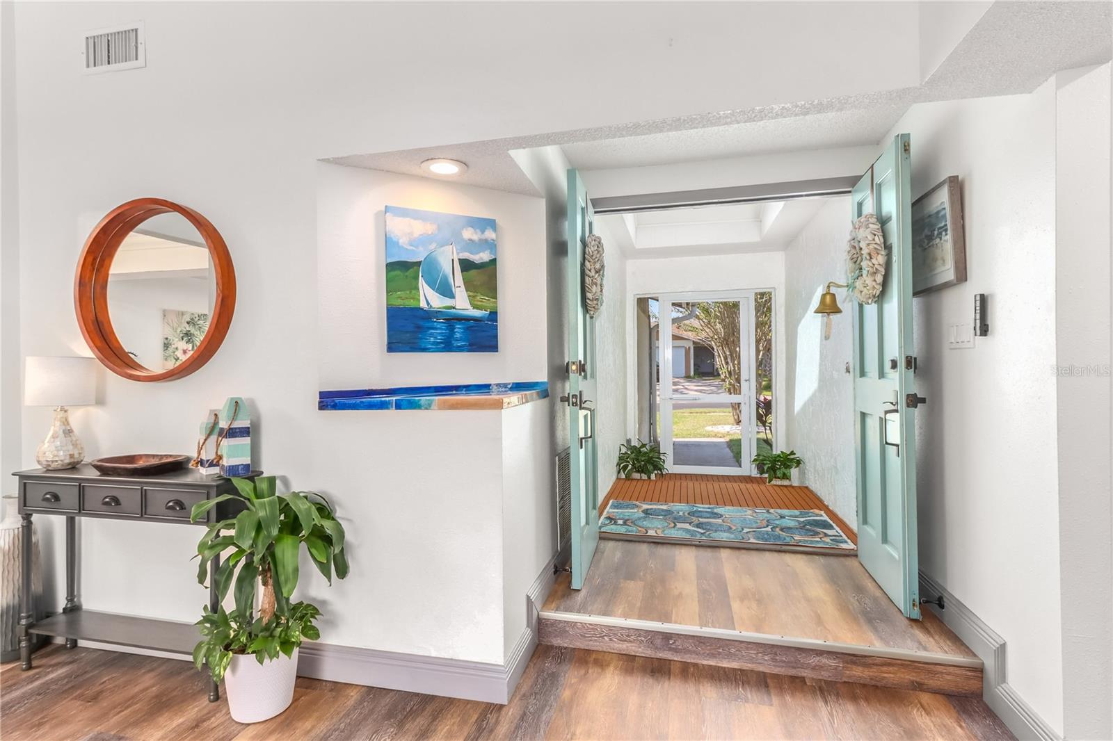 Very inviting and bright entry into the home!